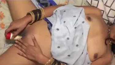 Hindi bf Bhabhi massaging Chut with a big dildo