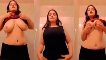 A nude big-boob girl flaunts her wealth.