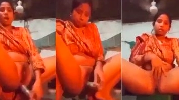 A woman has sex with a bottle camera.