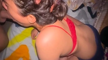 In bed, a man gives his wife a hard fuck.