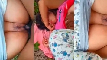 Outside of bushes, a man fucks his woman.